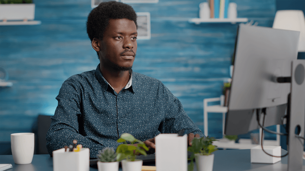 Young professional searching for verified jobs online in Nigeria