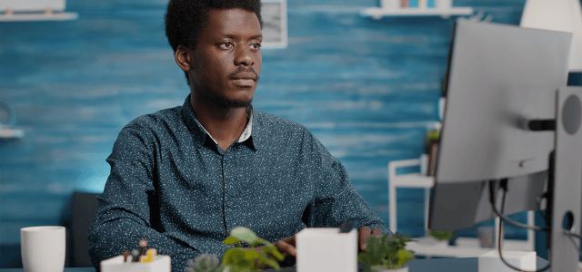 Young professional searching for verified jobs online in Nigeria