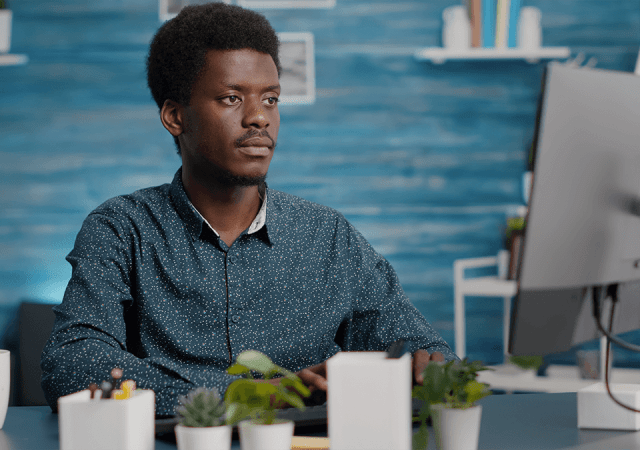 Young professional searching for verified jobs online in Nigeria