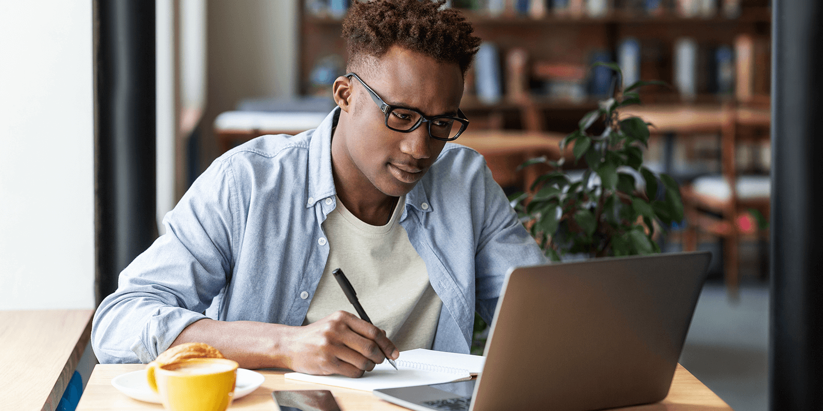 Nigerian professional working remotely using top remote job platforms with secure payment options.